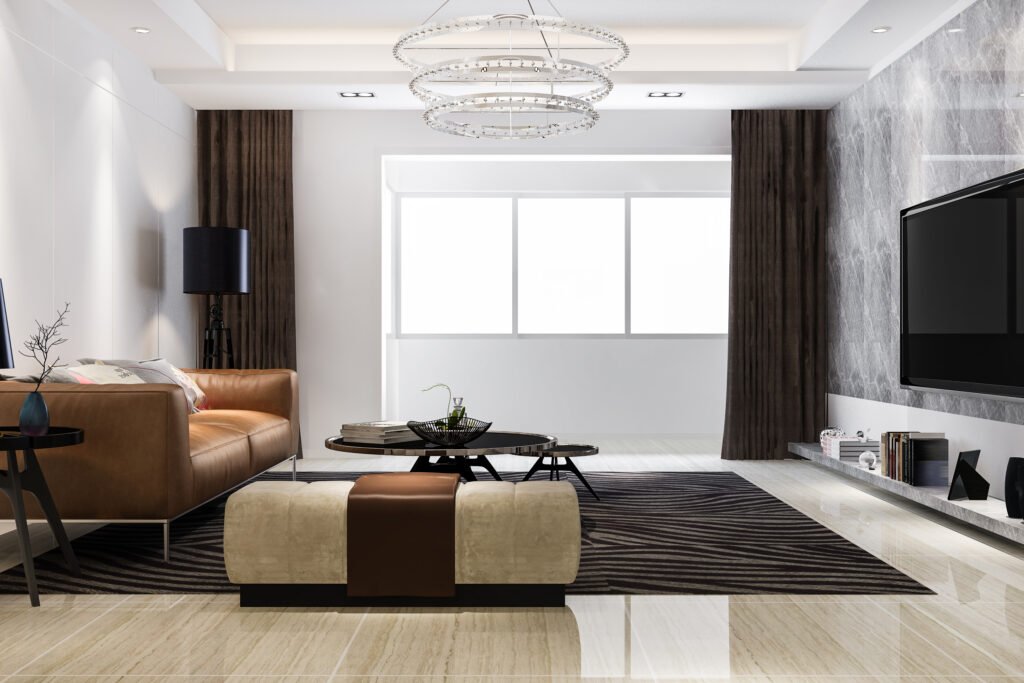 Sala de estar moderna com grandes portas e janelas de vidro, destacando iluminação natural e integração entre ambiente interno e área externa